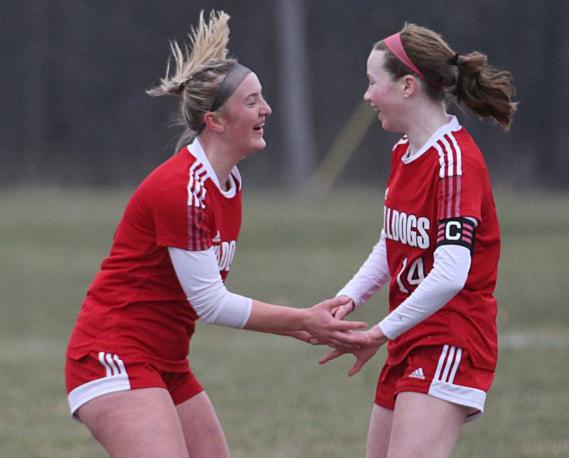 Streator's Josie Goerne celebrates with teammate Bridgit McGurk after McGurk scored the teams first goal against L-P on Friday, March 24, 2023 in Streator.