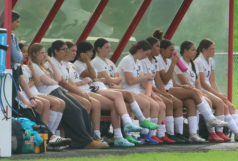 Members of the L-P girls soccer team watch the game from the bench on Monday, April 13, 2026 on King Field at Ottawa High School.