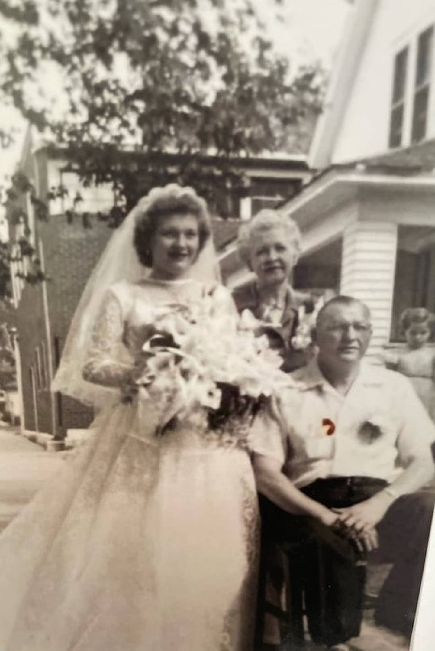 Former Wilmington resident Carol Juricic is pictured with her parents Alma and Arthur. Carol later became a foster parent to hundreds of children. She also adopted four children.