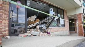 Car crashes into building in Woodstock Tuesday