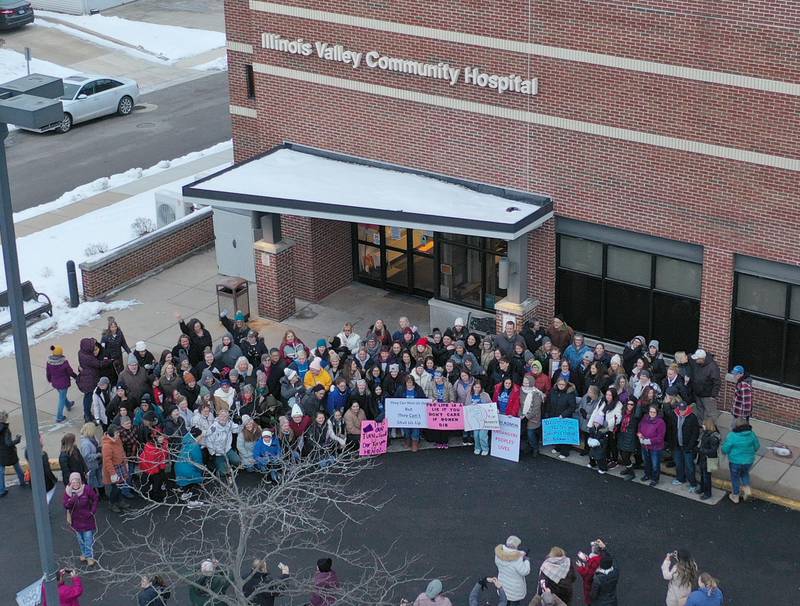 St. Margaret's employees gather outside outside St. Margarets Hospital (formally Illinois Valley Community Hospital) on Saturday, Jan. 28, 2023 in Peru. Employees and former employees gathered at the hospital after it closed at 7a.m. on Saturday morning. Hospital officials announced late last Friday their plans to suspend operations at St. Margaret's Health in Peru.