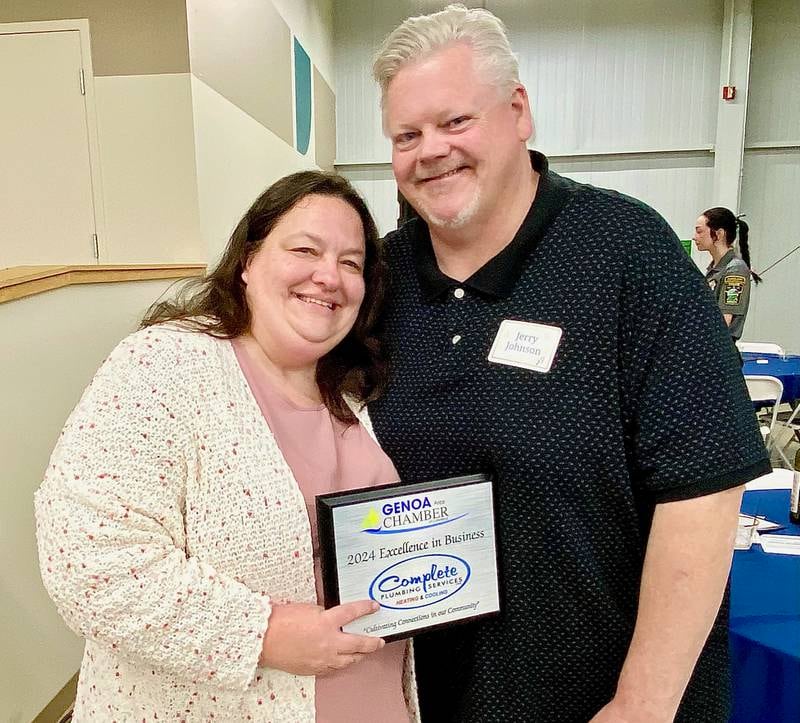 (From left) Tina Johnson and husband Jerry Johnson, owners of Complete Plumbing Services Inc., pose for a photo after receiving the Genoa Area Chamber of Commerce's 2024 Excellence in Business Award on Thursday, Feb. 13, 2025, at the chamber's 68th Annual Meeting and Awards Dinner at Custom Aluminum Products, 312 Eureka St., Genoa.