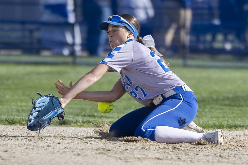 Newman’s Brenleigh Cook knocks down a hard grounder at shortstop against Princeton Monday, April 29, 2024.