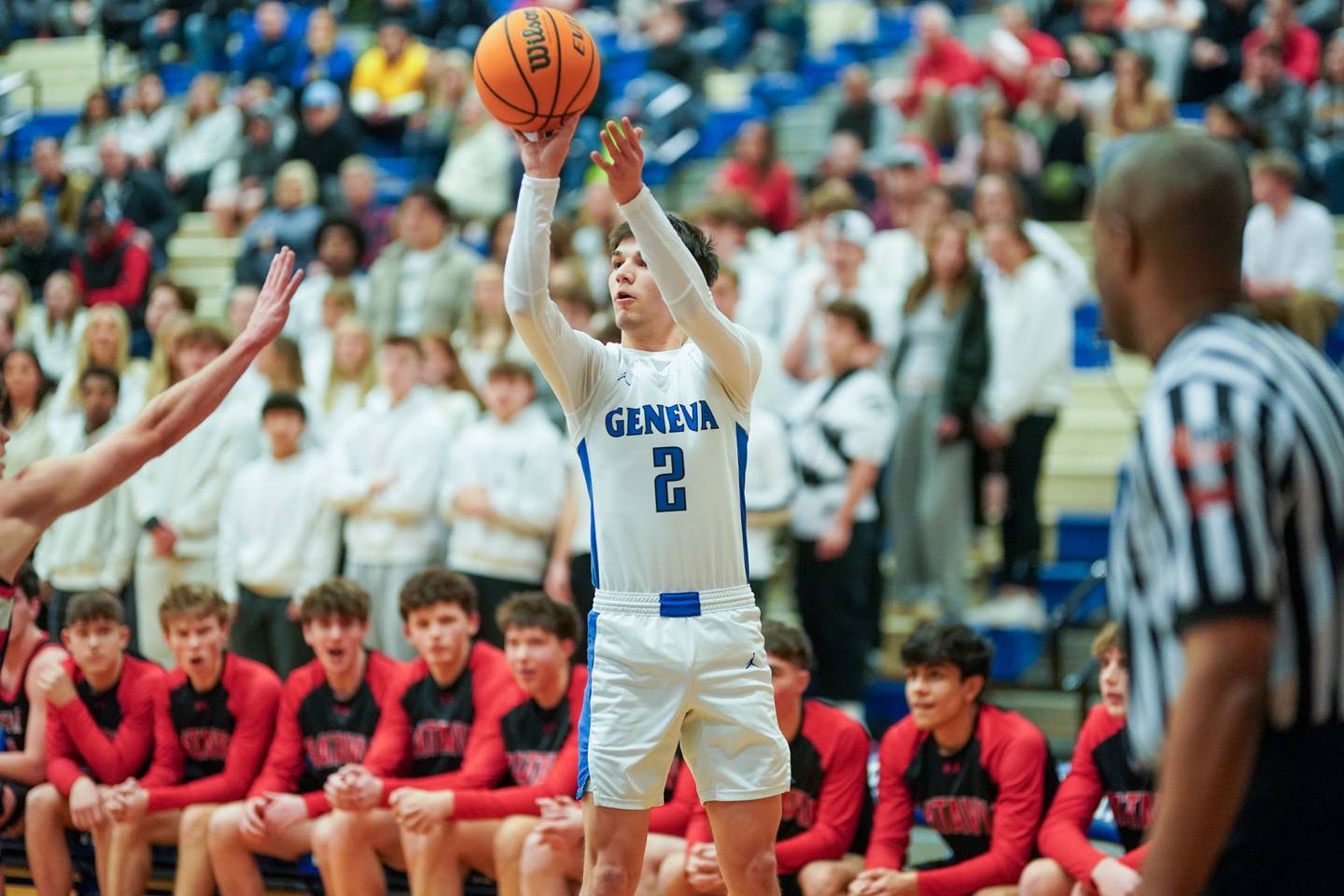 Geneva’s Gabe Jensen (2) shoots a three pointer against Batavia during a basketball game at Geneva High School on Friday, Feb. 7, 2025.