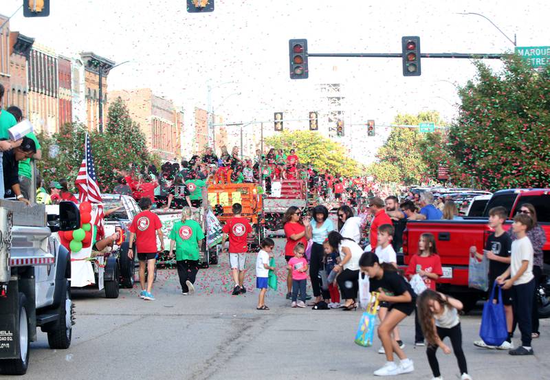 Confetti falls during the L-P Homecoming parade on Thursday, Oct. 5, 2023 downtown La Salle.
