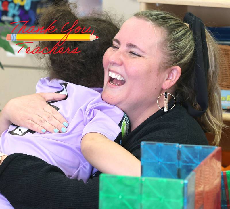Laurel Copeland, Little Spartans Early Learning Program teacher at South Prairie Elementary School, gets a hug from Avery Anderson during class Wednesday, April 6, 2023, at the school in Sycamore.