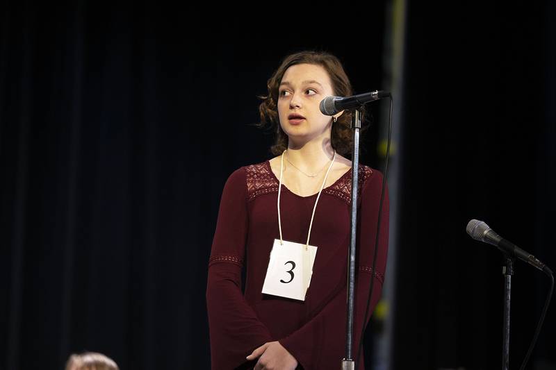 Erie Middle School eighth grader Taylor Robshaw appears on stage Thursday, March 9, 2023 during the Lee-Ogle-Whiteside Regional Spelling Bee.