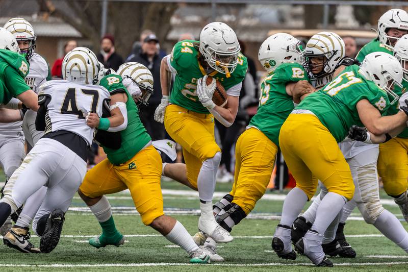 Providence's Broden Mackert finds an opening during a 5A varsity football semifinal game against Oak Forest at Providence Catholic High School on Nov. 22, 2025.