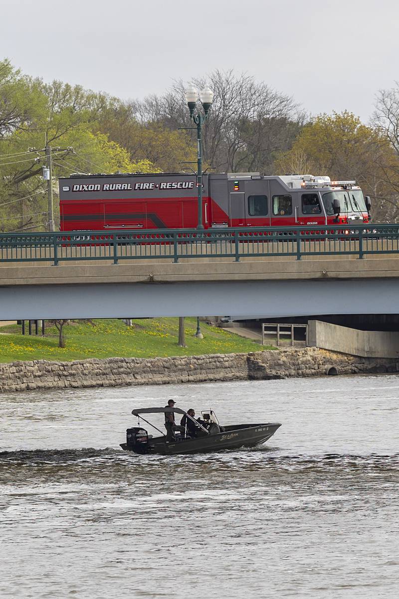 Search squads check the Rock River in Dixon Tuesday, April 14, 2026, after an individual jumped over the railing off of the Peoria Avenue Bridge late Monday night.