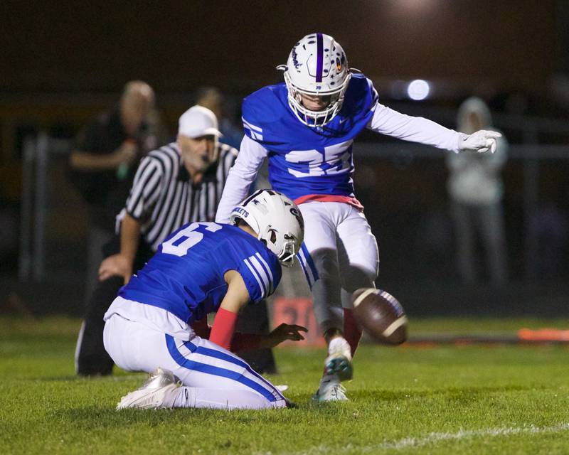 Burlington Central's David McCoy kicks a field goal against Jacobs on Friday, October 4,2024 in Burlington.