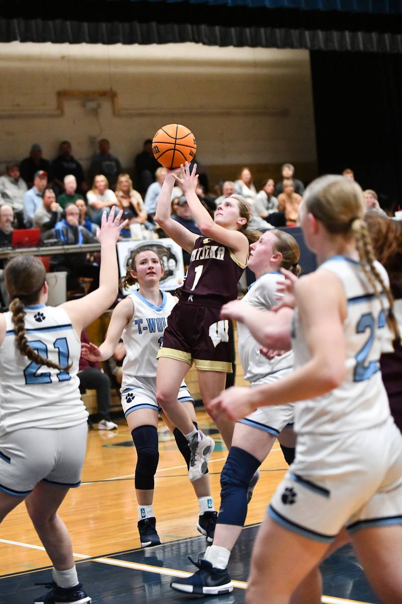 Watseka-Milford's Kami Muehling shoots from the paint over Cissna Park defenders on Monday, Feb. 10, 2025, during Cissna Park's 61-40 victory.