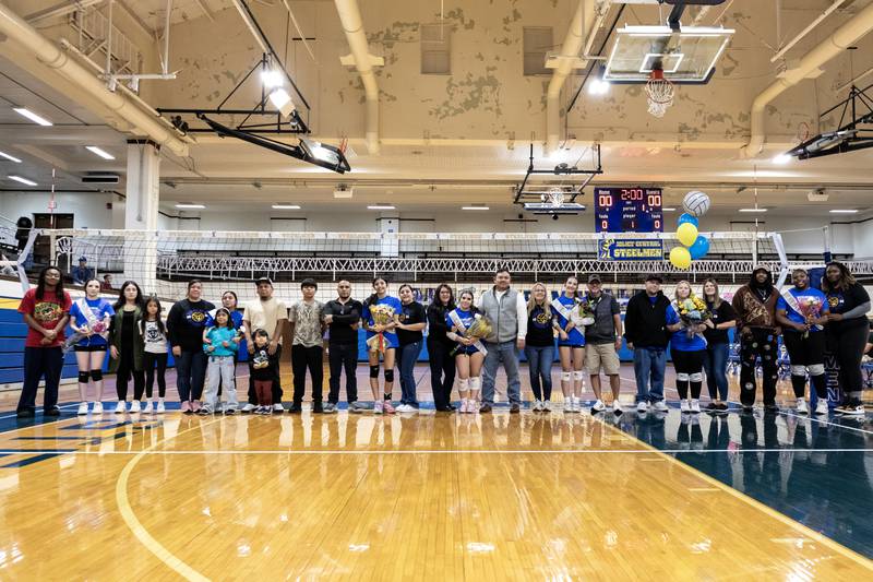 Joliet Central’s senior players are recognized before a varsity volleyball game against Illinois Mathematics and Science Academy at Joliet Central on Oct. 20, 2025.