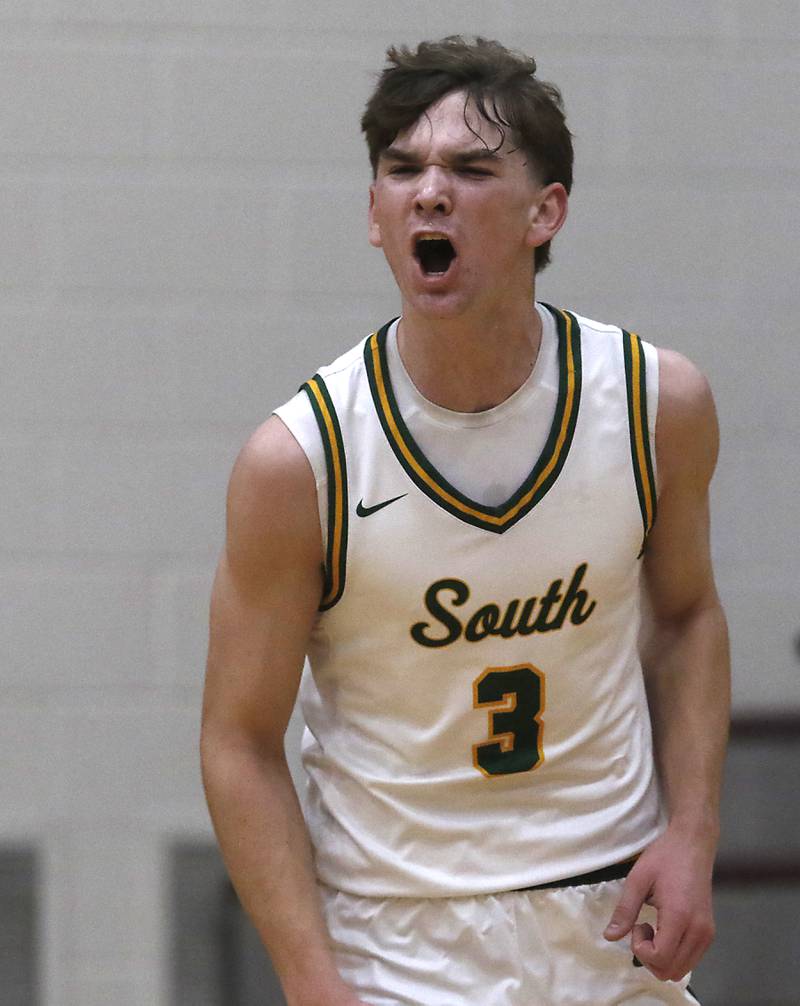Crystal Lake South's Nick Stowasser celebrates a three-point shot during the IHSA Class 3A Prairie Ridge Regional championship basketball game against Cary-Grove on Friday, Feb. 28, 2025, at Prairie Ridge High School in Crystal Lake.
