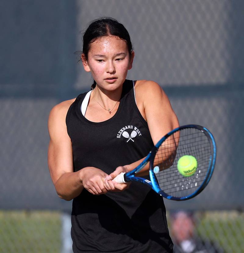 Glenbard WestÕs Mira Kernagis returns a volley in the 2A Singles 3rd Place Match at the IHSA State Tennis Finals Saturday October 21, 2023 in Buffalo Grove.