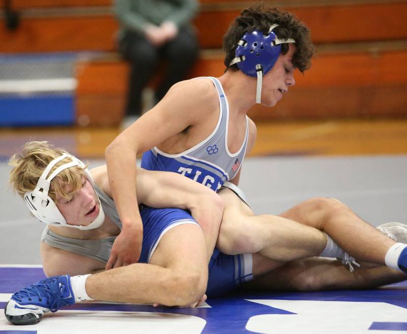 Princeton's Augie Christiansen wrestles L-P's Zach Pocivasek on Thursday, Jan. 19, 2023 at Princeton High School.