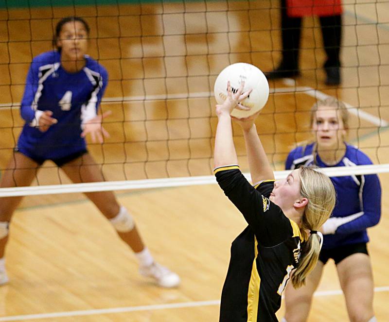 Putnam County's Tori Balma hits the ball to the Newark side of the net in the Class 1A semifinal game on Wednesday, Oct. 16, 2022 at St. Bede Academy in Peru.