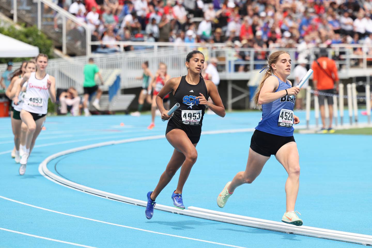 St. Charles North’s Alanna Gupta competes in the 4x800 relay during the IHSA Class 3A Girls Track & Field State Finals on Saturday, May 24, 2025.
