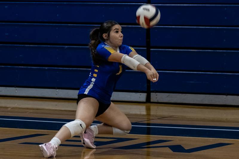 Joliet Central's Andrea Mireles makes a nice play during a varsity volleyball game against Illinois Mathematics and Science Academy at Joliet Central on Oct. 20, 2025.