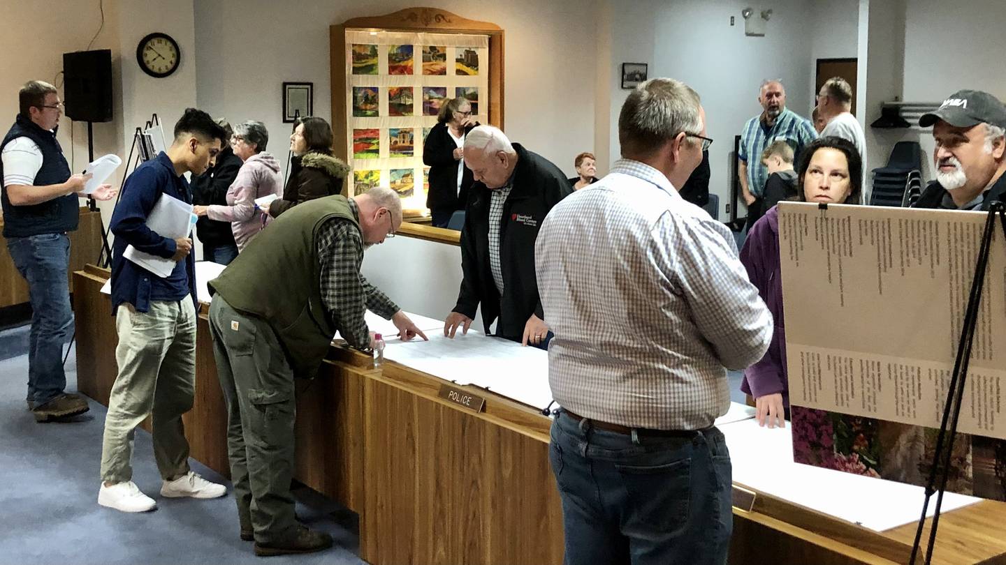 Sandwich residents had the opportunity to view project plans and question the panel of consulting engineers, project managers and city officials at the pre-construction open house for the rebuild of North Latham Street at Sandwich city hall April 13.