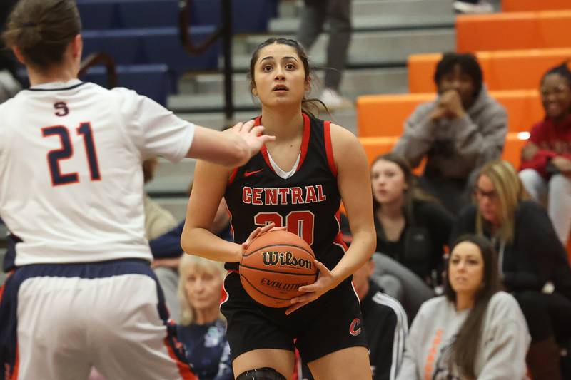 Lincoln-Way Central’s Lina Panos lines up a shot against Stagg on Monday, Dec. 11th, 2023 in Palos Hills.