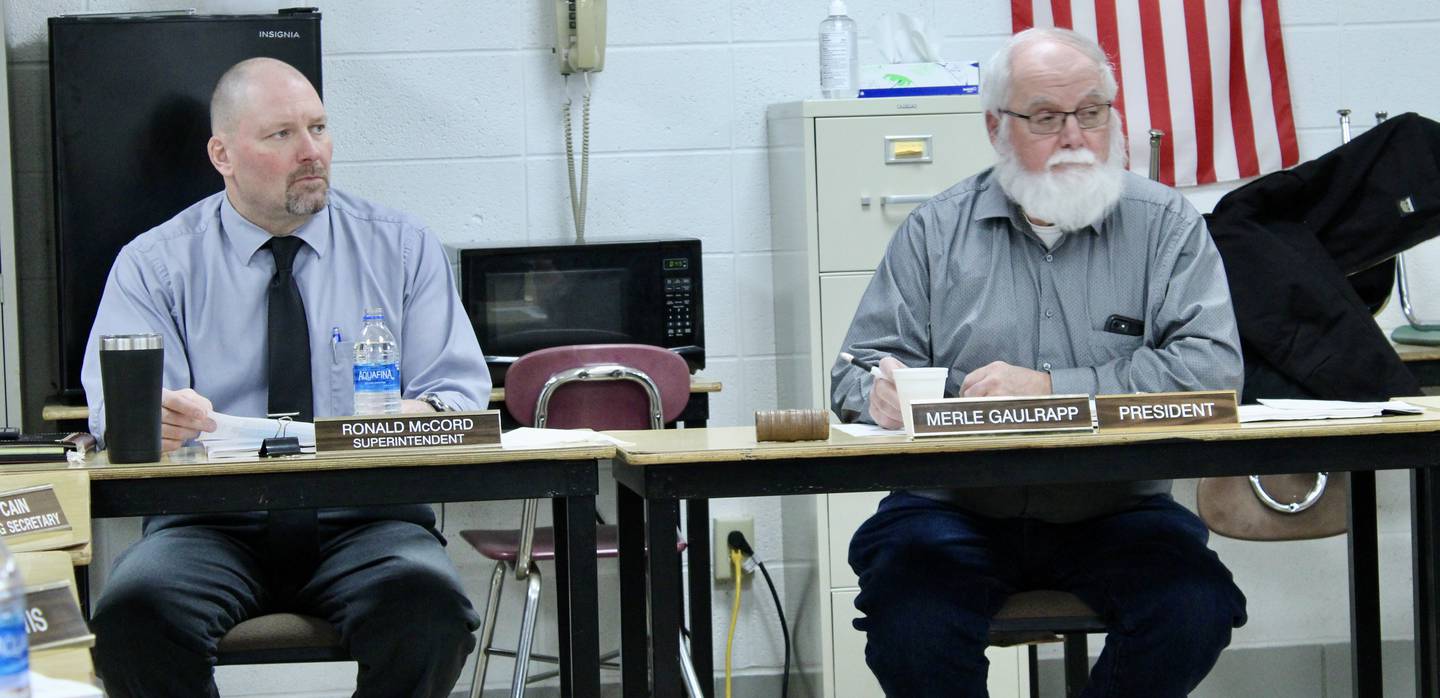 Merle Gaulrapp, right, president of the Rock Falls High School board of education, convenes Wednesday night's session, sitting alongside Superintendent Ron McCord. The district instituted a mask optional policy for students, teachers and staff on Wednesday in light of action by a state legislative judicial committee that chose not to renew emergency rules that validated Gov. JB Pritzker's order on masks while related lawsuit was still in the courts.