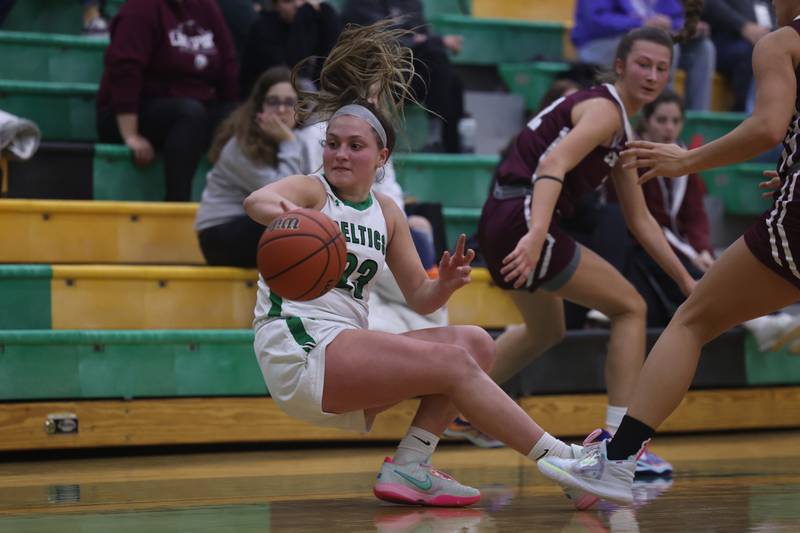 Providence’s Annalise Pietrzyk recovers and passes off the loose ball against Lockport.