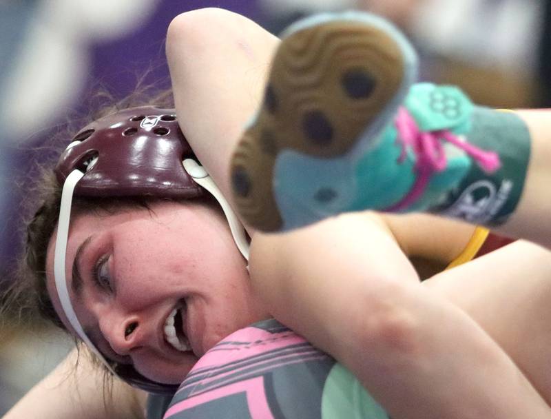 Richmond-Burton’s Breanna Warren battles Woodstock’s Kyla Hayes at 120 pounds in Whip-Pur Women’s Classic varsity girls wrestling on Saturday, Dec. 20, 2025, at Hampshire High School in Hampshire.