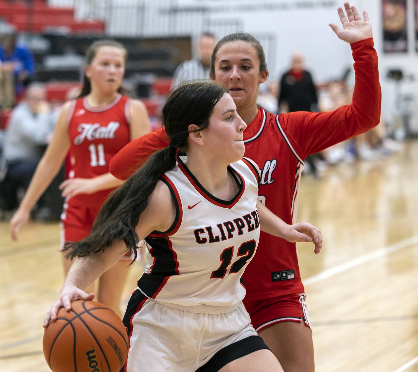 Amboy’s Addison Pertell drives the baseline against Hall Wednesday, Dec. 27, 2023 during the Amboy Holiday Basketball tournament.