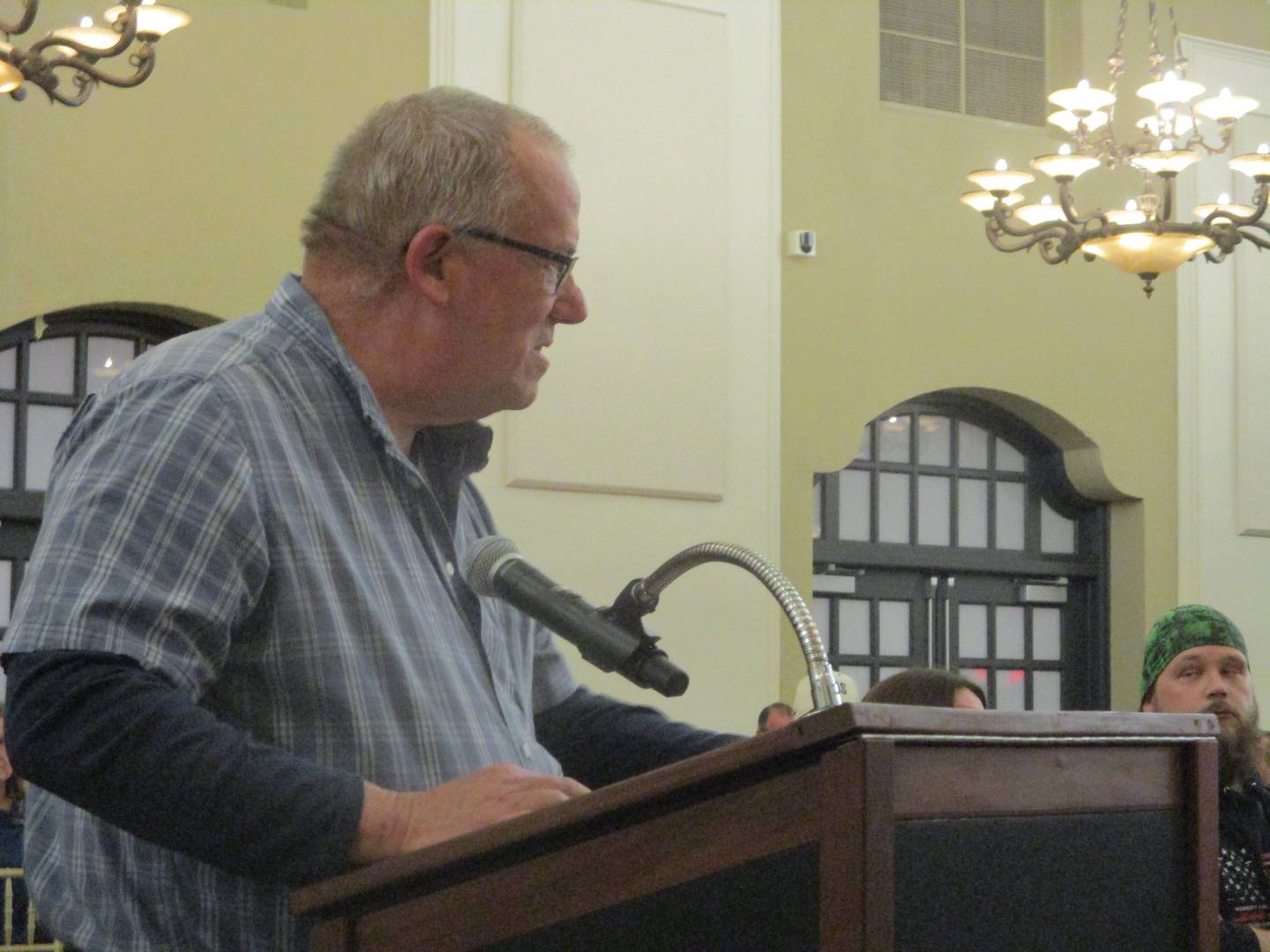 Manhattan Township Trustee Paul Woodcock speaks against the Earthrise Energy's Pride of the Prairie solar plan  during a public hearing on Tuesday. March 31, 2026