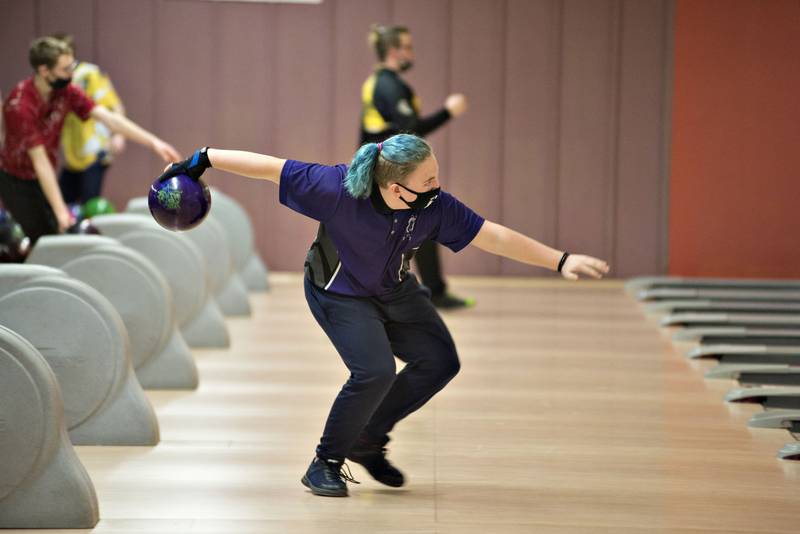 Dixon's Cody Deil loads up for the roll during bowling regionals in Sterling on Saturday, Jan. 15, 2022.