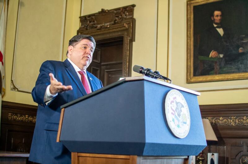 Gov. JB Pritzker takes questions from reporters on January 8, 2025