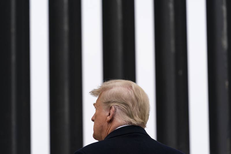 President Donald Trump tours a section of the U.S.-Mexico border wall, Tuesday, Jan. 12, 2021, in Alamo, Texas. (AP Photo/Alex Brandon)