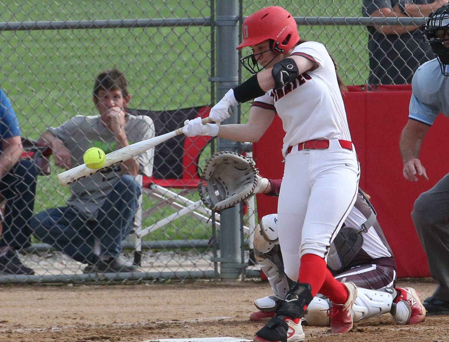 Ottawa's Maura Condon smacks a hit against Morris on Monday, May 15, 2023 at Ottawa High School.