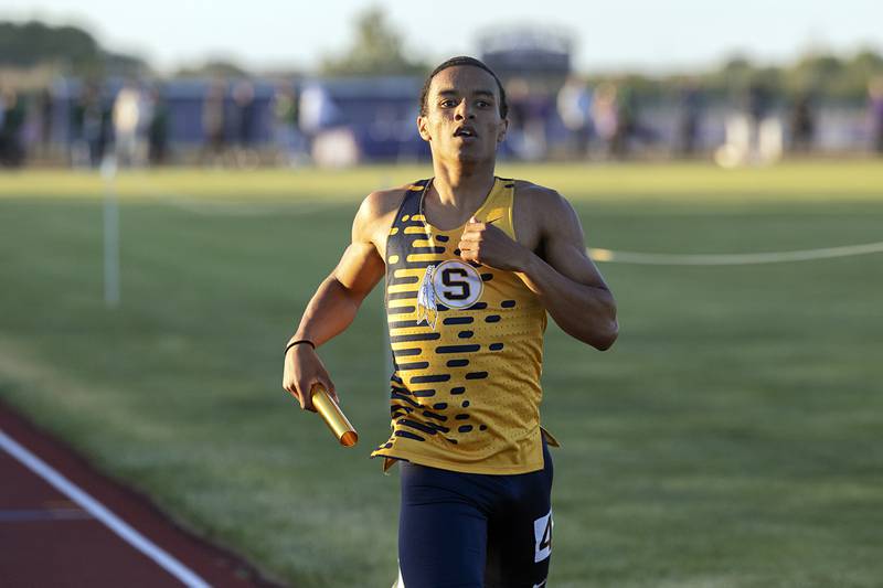 Sterling’s Derek Prieto crosses the finish in the 4x4 relay Wednesday, May 20, 2026, at the Rochelle Class 2A boys track sectionals.