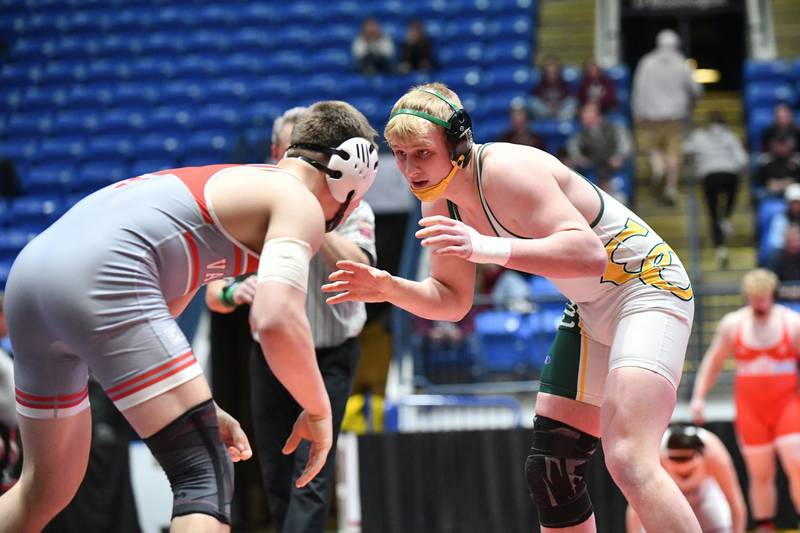 Cade Poyner of Coal City wrestles Ross Miller of Vandalia in the 190-pound match during the IHSA Dual Team State Finals in Bloomington on Saturday, March 1.
