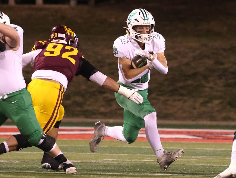 York’s Henry Duda tries to get by Loyola Academy's Kai Calcutt during their Class 8A state championship game Saturday, Nov. 30, 2024, in Hancock Stadium at Illinois State University in Normal.