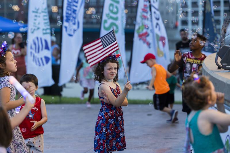 Children celebrate Thursday, July 3, 2025, to the music of Evergreen, during Rock Falls Tourism’s 4th of July celebration at RB&W Park. Music, food and of course fireworks kick off the weekend of American independence.