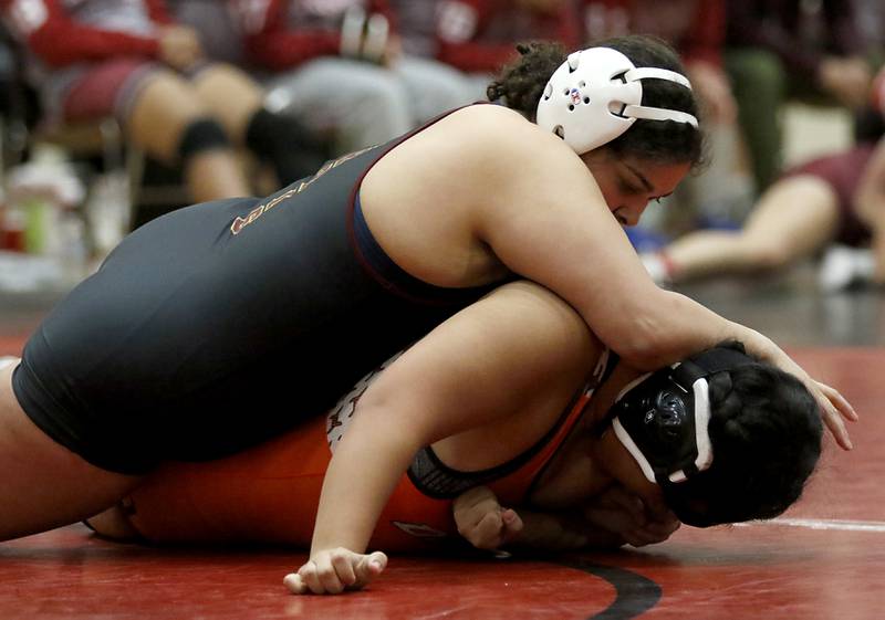 Morris’ Morgan Congo tries to turn DeKalb’s Val Rodriguez in the 190-pound match of a nononference wrestling meet on Wednesday, Jan. 22, 2025, at Huntley High School.