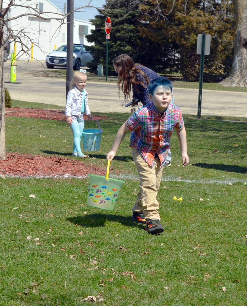 Miles Huenefeld, 6, of Forreston, searches for prizes during an Easter egg hunt in Forreston's Memorial Park on April 8, 2023. The Forreston Lions Club and Forreston Area Business Association sponsored the annual Easter egg hunts and a Touch-A-Truck event.