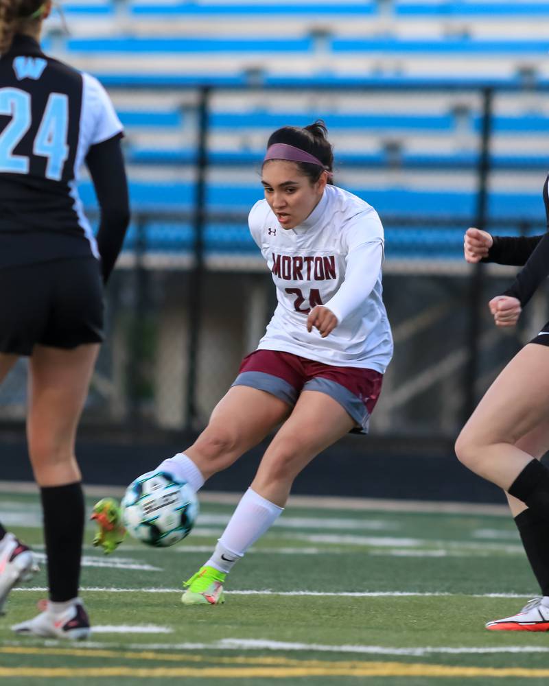 Morton's Aaliyah Leanos (24) kicks for at goal for a score during soccer match between Morton at Willowbrook. April 14, 2022.
