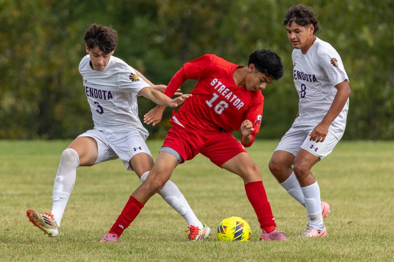 (from left) Gael Garcia (3) of Mendota attempts to steal ball from under Erik Mosqueda (16) of Streator as Ramiro Palacios (8) of Mendota stands by on Saturday, Aug 30, 2025 at the James Street Recreation Area in Streator.