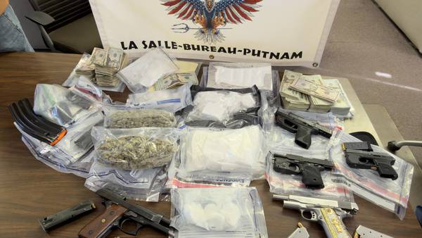 Two charged in Bureau County after cops seize guns, cocaine, cash