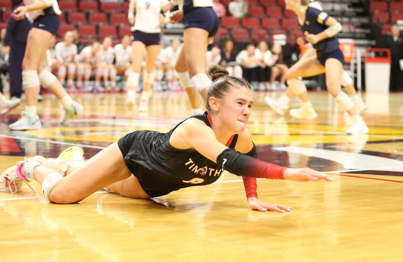 Timothy Christian's Elizabeth Alex dives for the ball while playing Bloomington Central Catholic during the Class 2A State semifinal game on Friday, Nov. 15, 2024 at CEFCU Arena in Normal.