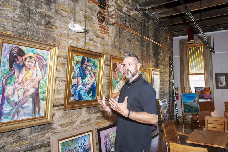 Phil Atilano, new executive director of The Next Picture Show fine arts community center in downtown Dixon,  is remaking the the storage space upstairs into more exhibit space.