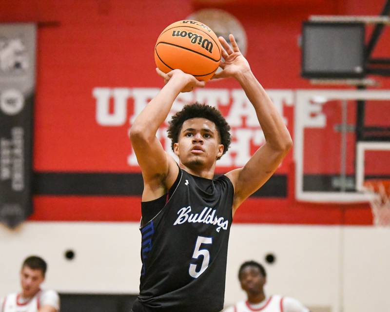 Riverside Brookfield's Cameron Mercer (5) makes two free throws after a technical foul was called on Glenbard East during the game on Friday Dec. 19, 2025, held at Glenbard East High School.