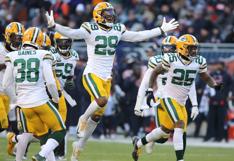 The Green Bay Packers defense celebrates an interception during their game against the Chicago Bears Sunday, Dec. 4, 2022, at Soldier Field in Chicago.