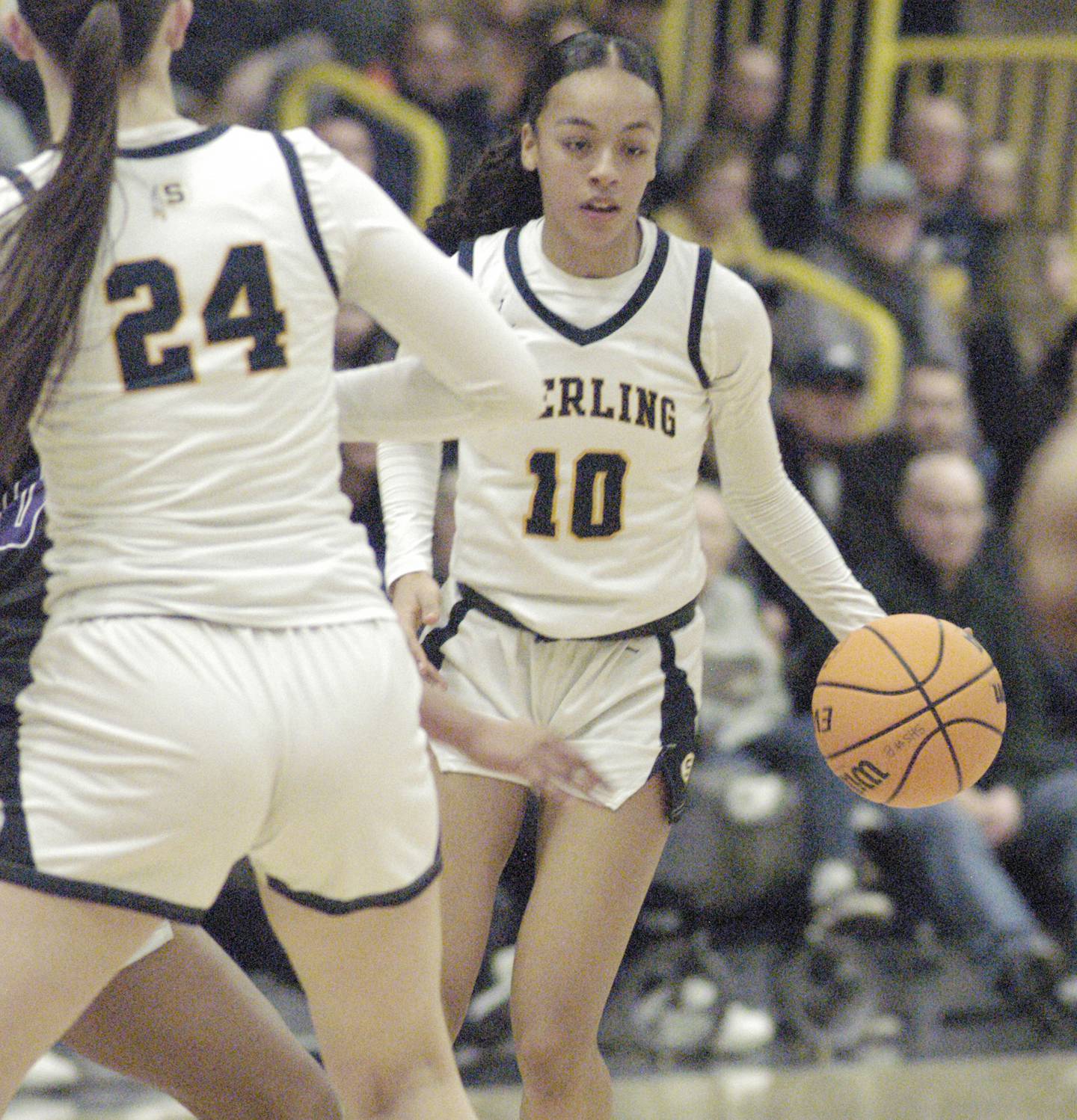 Sterling's Nia Harris brings the ball up. The Sterling Golden Warriors faced off against Plano Lady Reapers in an IHSA 3A Regional girls final at Musgrove Fieldhouse in Sterling on February 20, 2025. Sterling won the game 70-38.