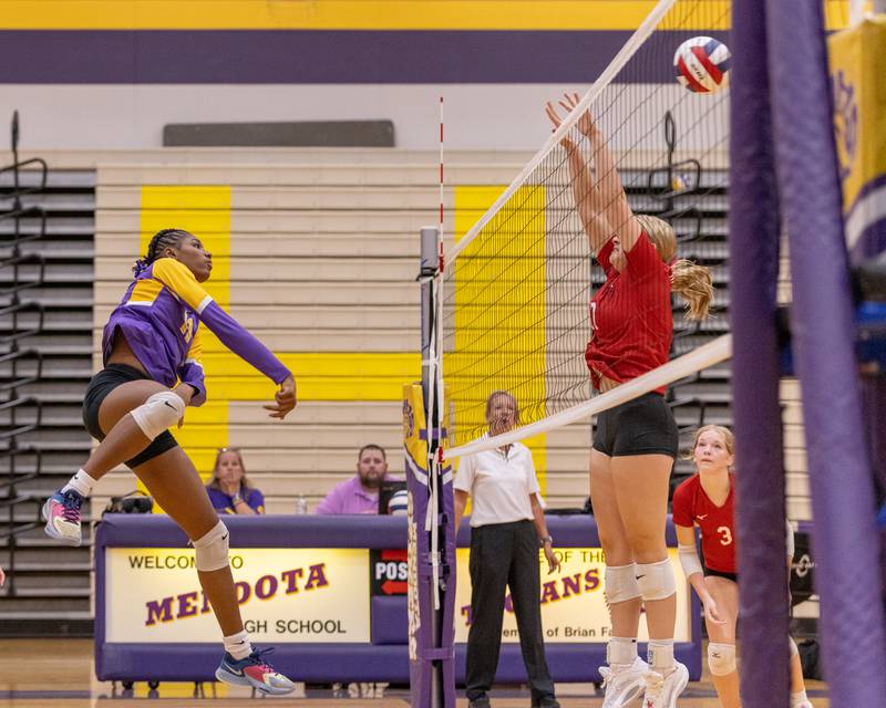 Mariyah Elam sends a shot through the hands of a Hall High School defender at the net during the match at Auxiliary Gym on September 2, 2025 at Mendota High School.