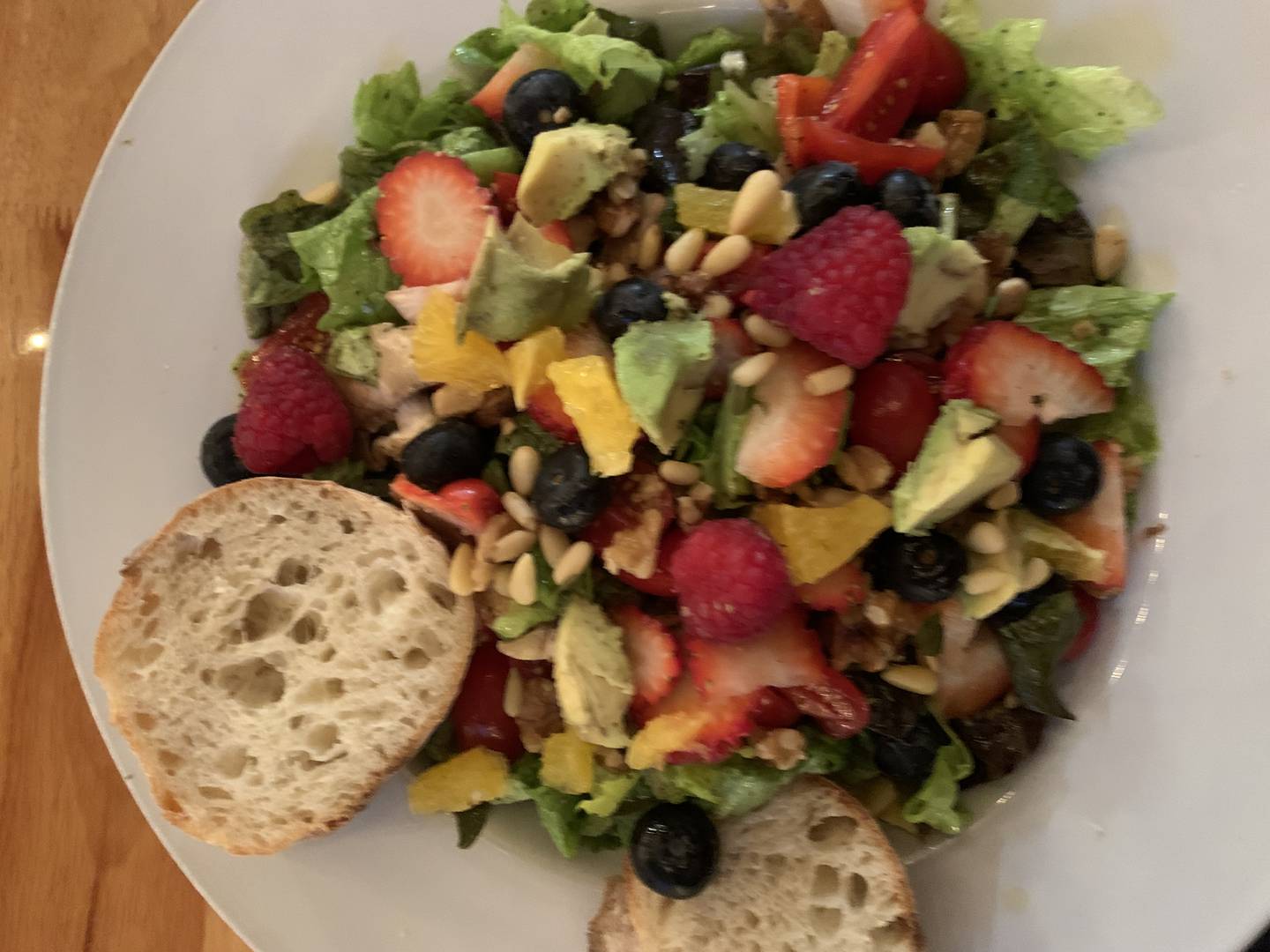 The Garden of Eatin’ Salad, which includes red leaf and spring mix lettuce, tomato, mushrooms, sweet peppers, avocado, onions, blue berries, strawberries, orange, pine nuts, walnuts and olive oil.