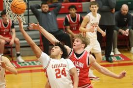 Photos: L-P takes down Ottawa 45-37 in boys basketball rivalry 